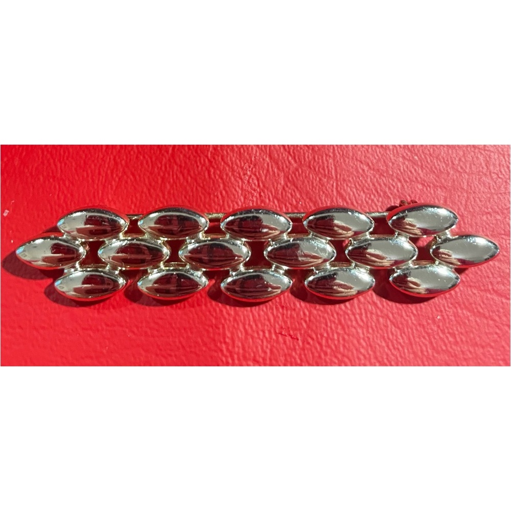 Silvertone pin/brooch